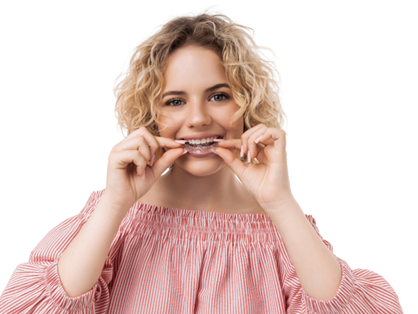 Teen smiling with braces at Brieden Orthodontics