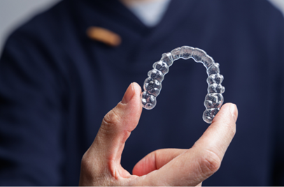 Dr. Brieden consulting with a patient about clear aligner treatment